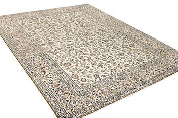 A Kashan carpet, c. 387 x 290 cm.