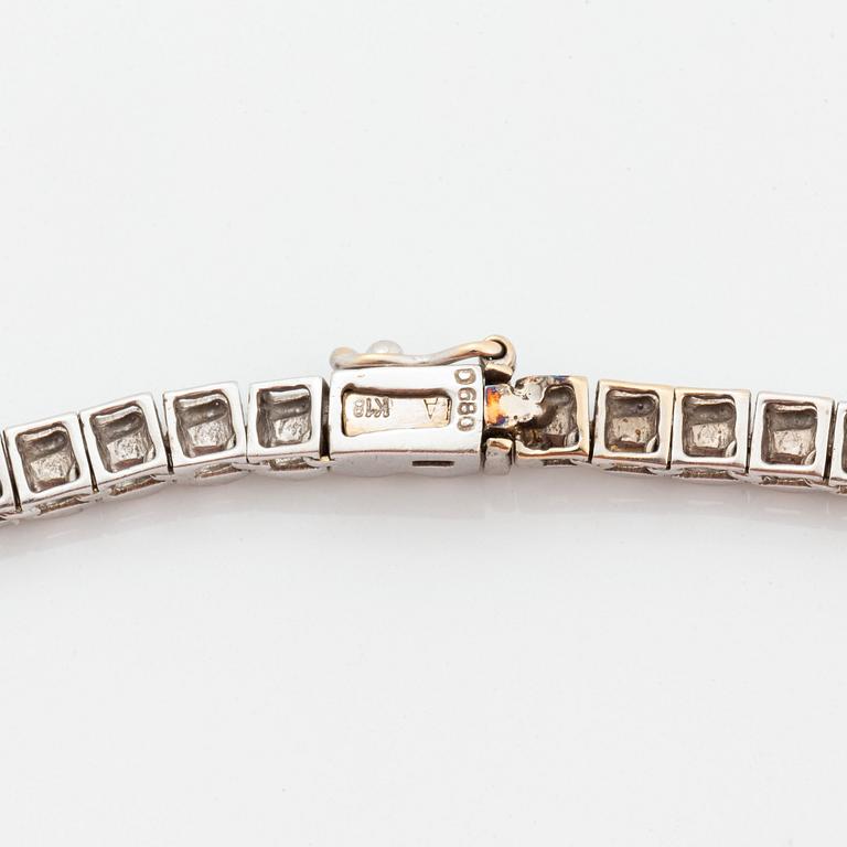 Collier rivière 18K vitguld runda briljantslipade diamanter.