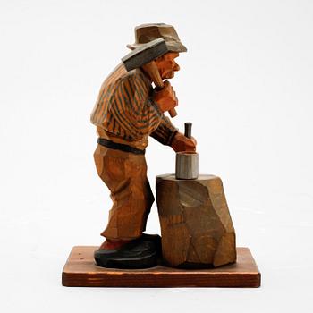 A signed wooden sculpture by CARL OLOF TRYGG.