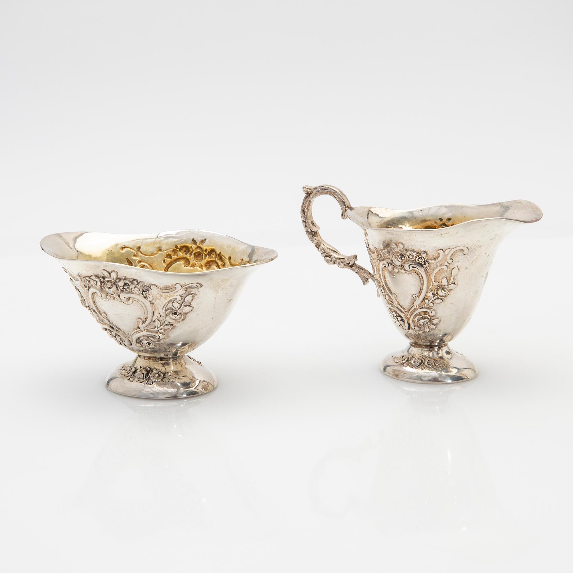 Cream jug and sugar bowl, silver, early 20th century.
