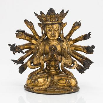 A gilt-bronze figure of a Boddhisattva, Ming dynasty (1638-1644).