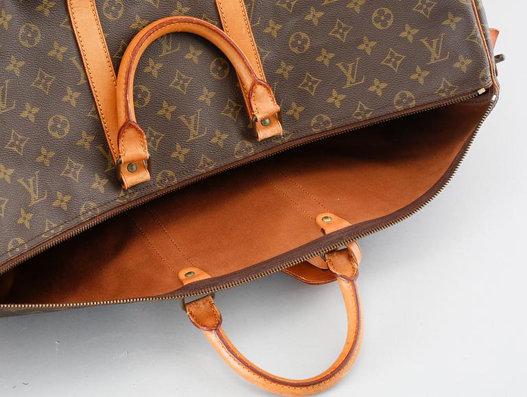 A monogram canvas weekendbag "Keepall 55" by Louis Vuitton.