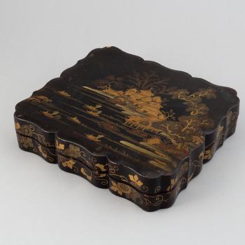 A box containing smaller boxes and mother of pearl chips for games, late Qing dynasty, 19th Century.