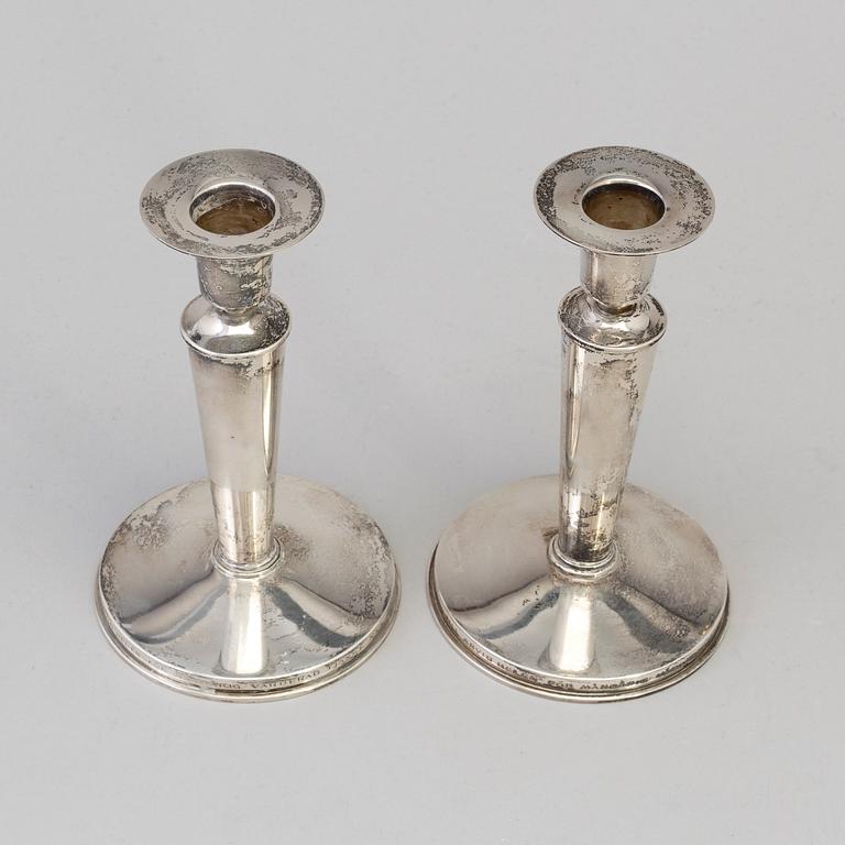 A pair of candlesticks, silver, Borgila 1965.