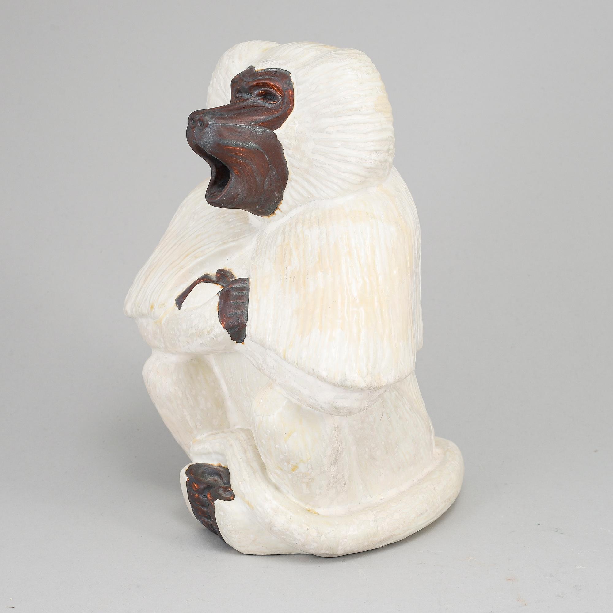 GUNNAR NYLUND, a stoneware sculpture of a monkey, Rörstrand mid 20th century.