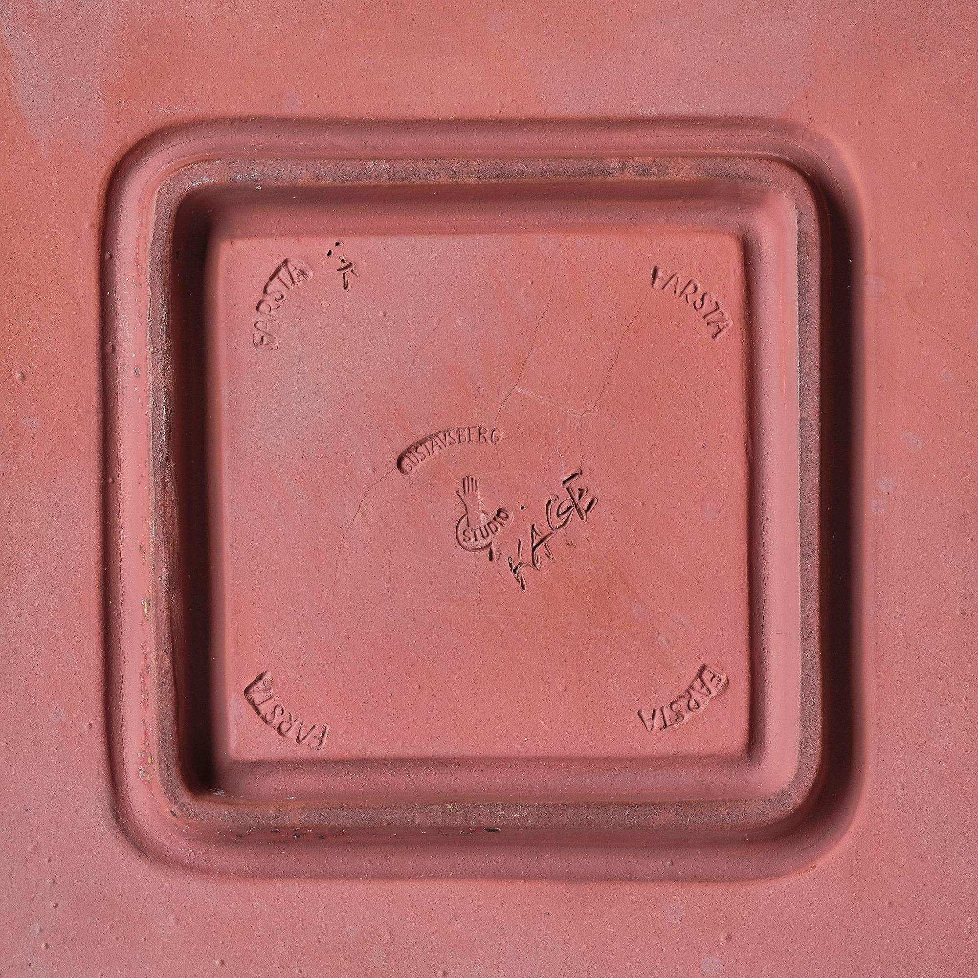 Wilhelm Kåge, a "Farsta" stoneware dish decorated with a face, Gustavsberg Studio, 1957.