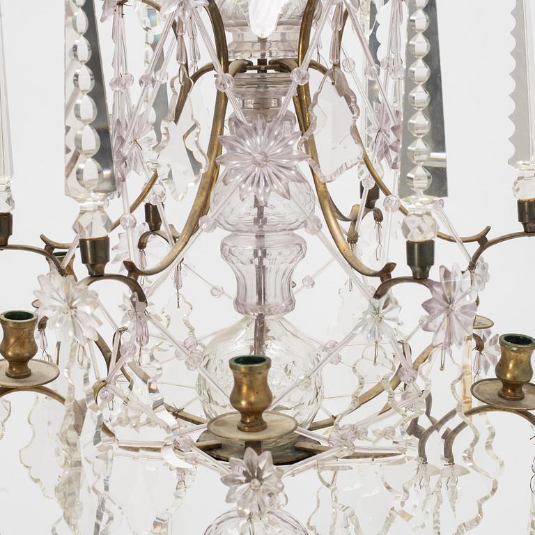 A six-light rococo-style chandelier, late 19th century incorporating older elements.