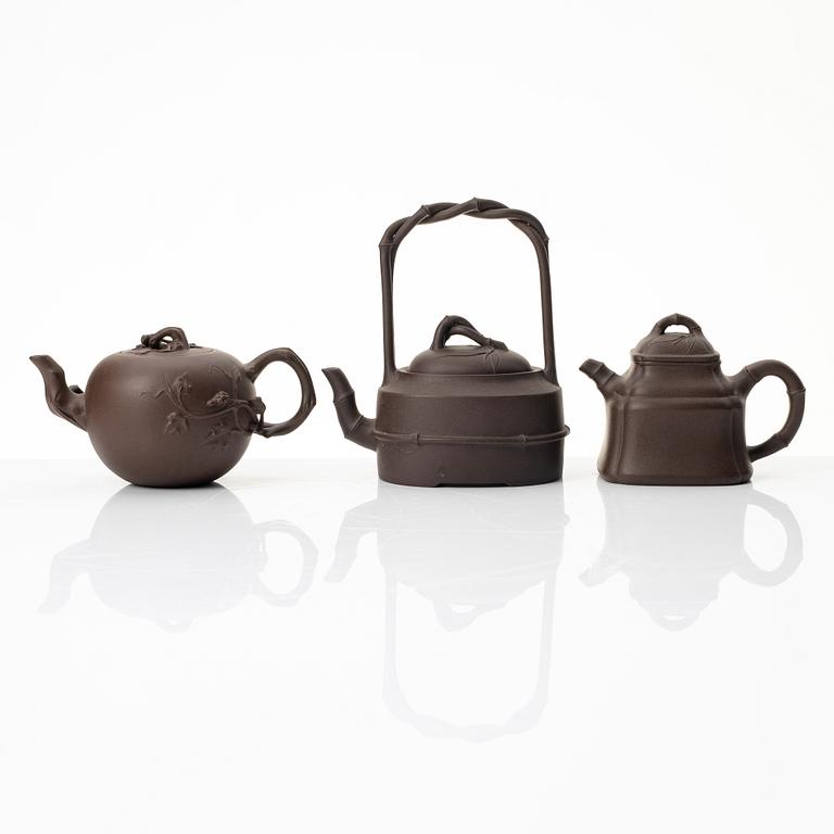 A group of three Chinese yixing teapots, 1980s.