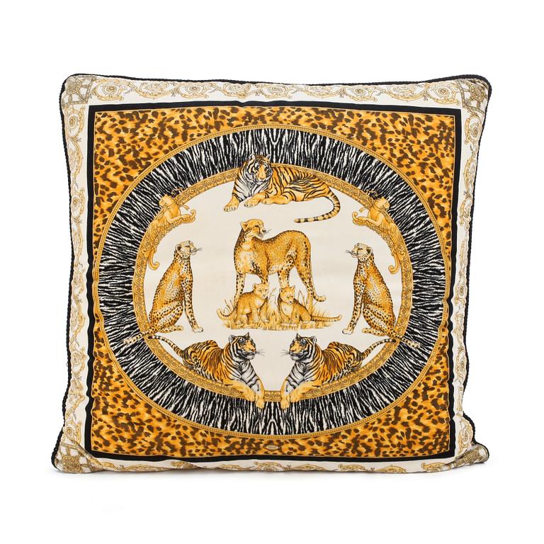 VERSACE, a velvet pillow.