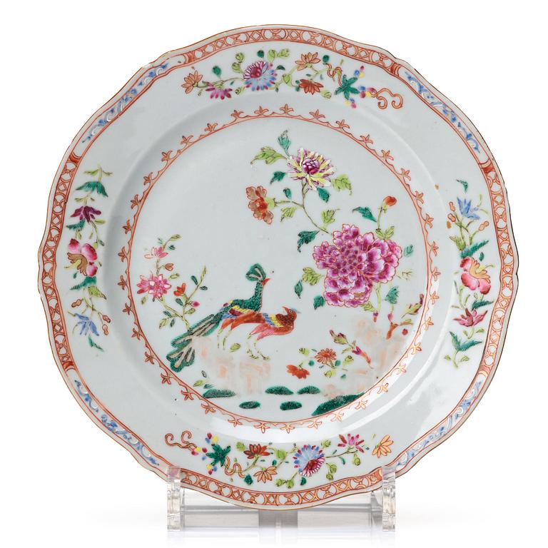 A set of 10 famille rose 'double peacock' dinner plates, Qing dynasty, Qianlong (1736-95).