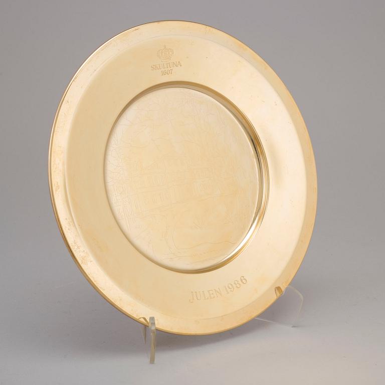 12 brass plates from Skultuna, late 20th century.