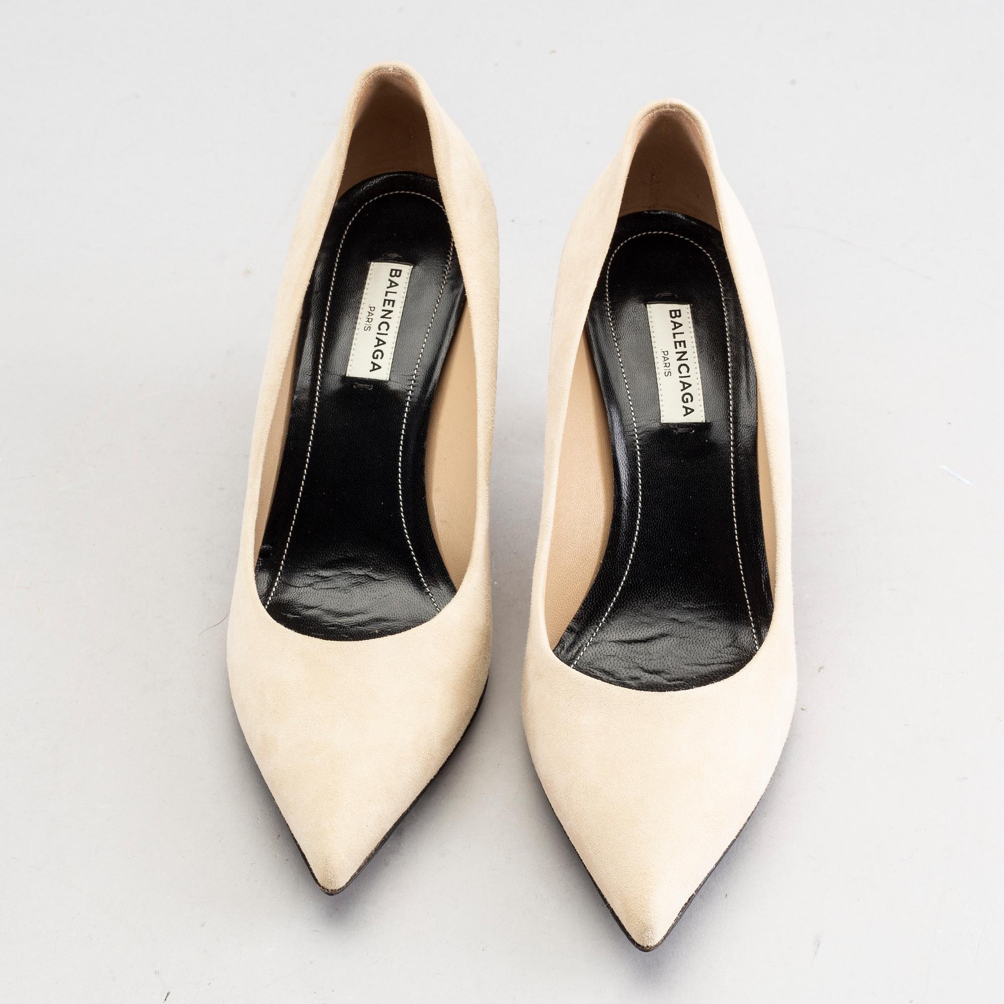 A pair of Balenciaga beige suede shoes size 38.