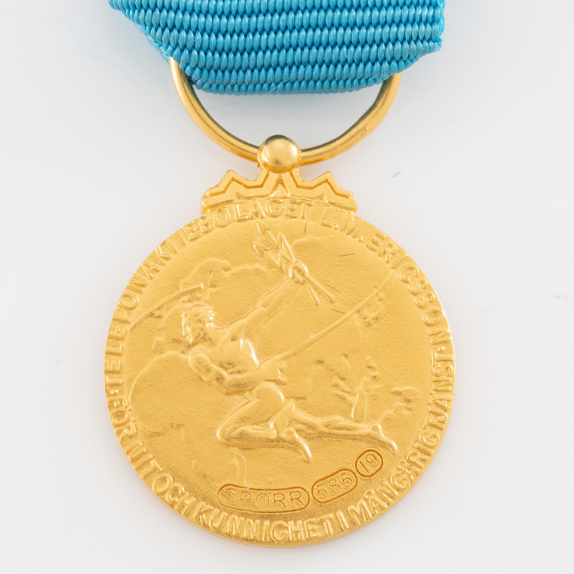Medal, 14k gold, LM Ericsson, for merit and skill.