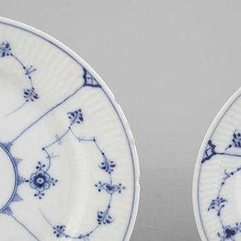 A group of eleven 'Blue Fluted Plain' /'Musselmalet' porcelain dishes and plates, Royal Copenhagen, 1893-1923 and later.