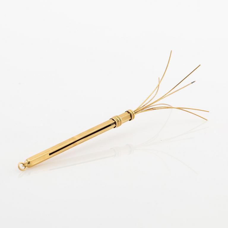Champagne whisk 18K gold.