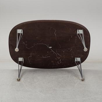 A 'Super-elliptical table by Piet Hein & Bruno Mathsson for Fritz Hansen.