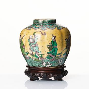 A melon shaped jar decorated with the eight immortals, 17th Century.