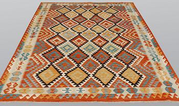 A carpet, kilim, ca 304 x 210 cm.