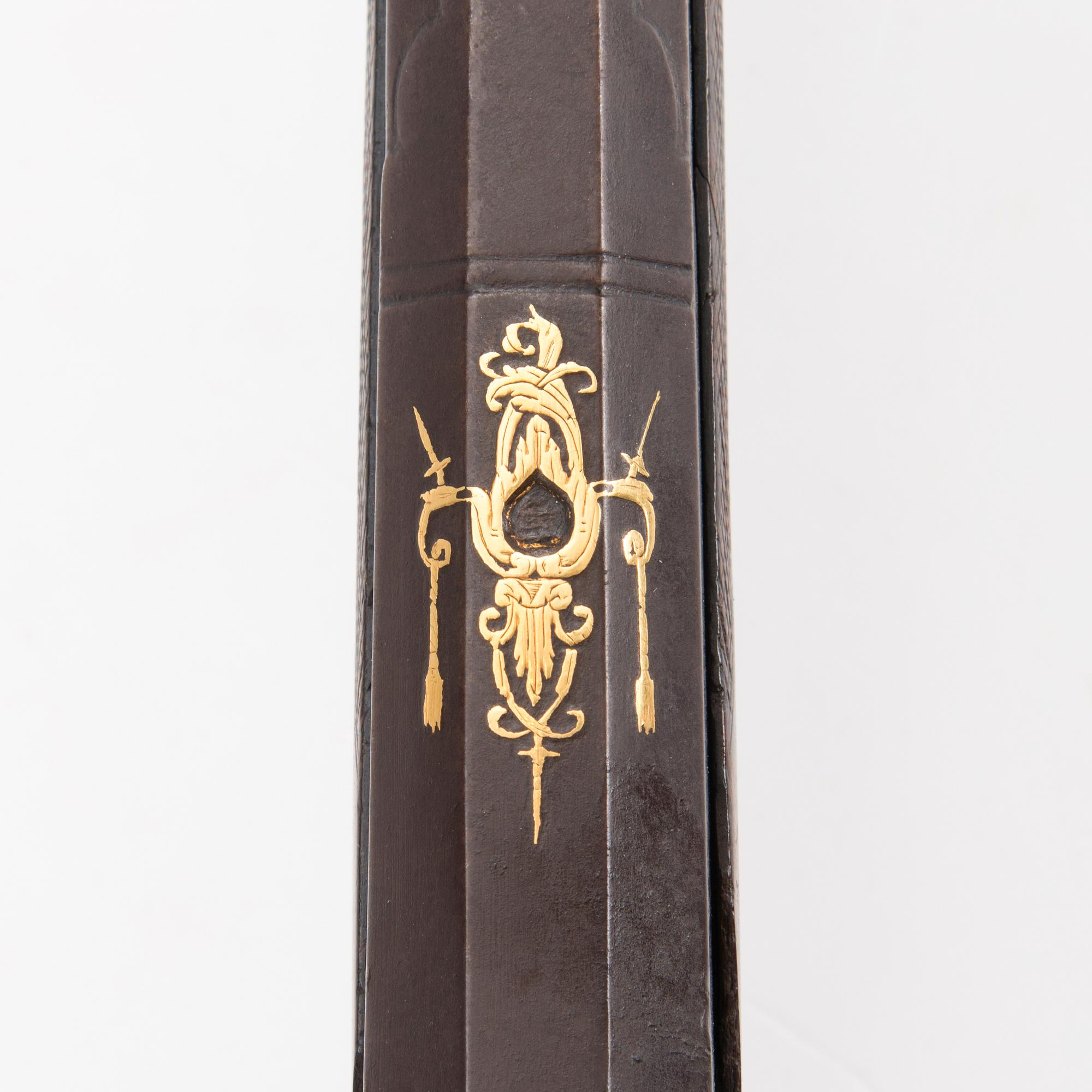 A mid 19th Century percussion rifle.