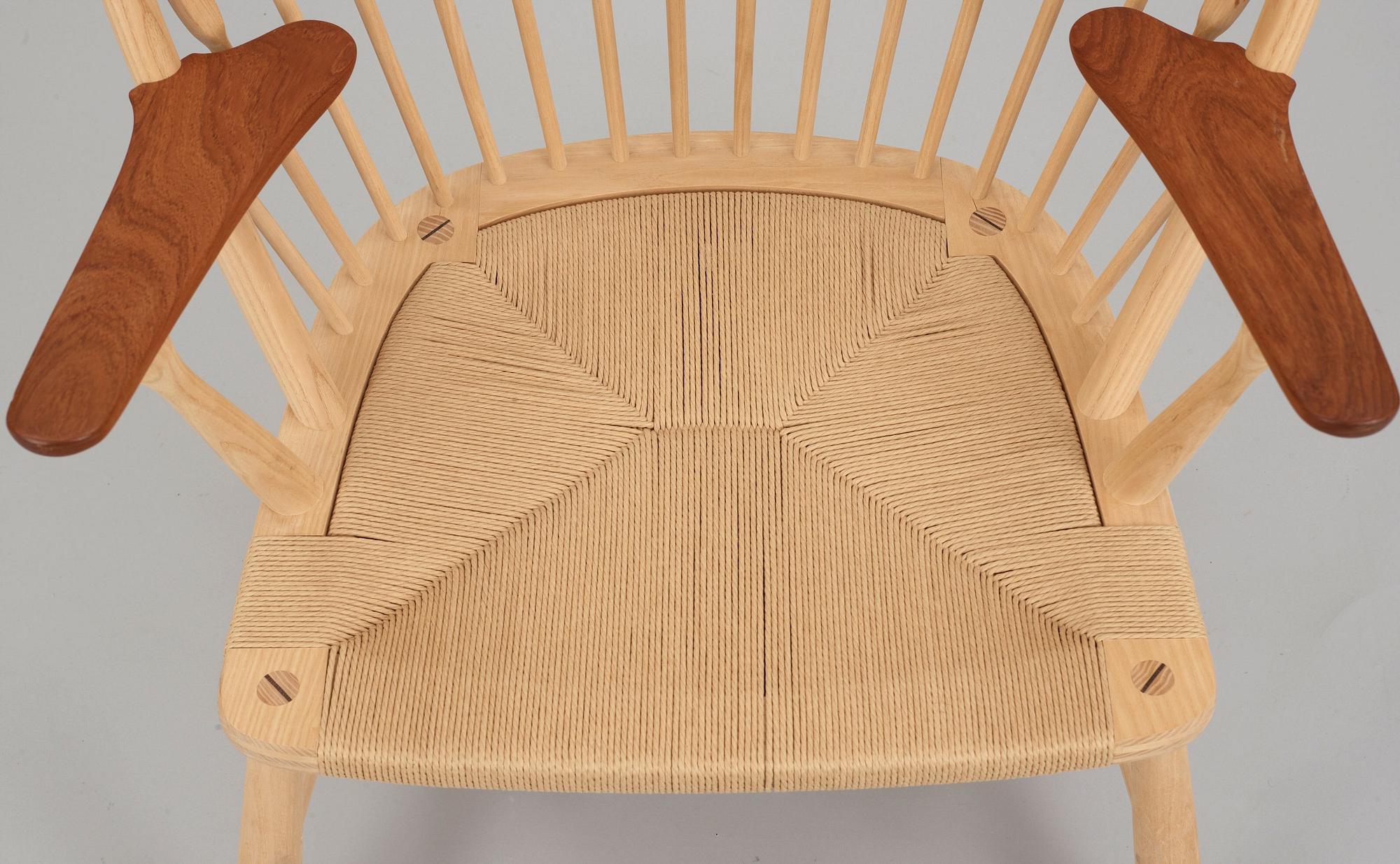 A Hans J Wegner ash and teak 'Peacock chair', by PP Møbler, Denmark.