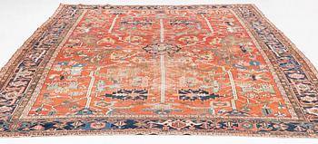 A antique Heriz carpet, ca 384 x 275 - 290 cm.
