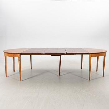 Dining table, turn of the 20th century.