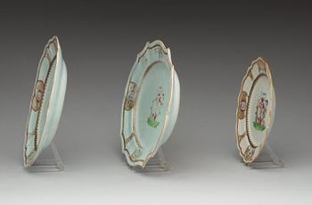 Two armorial dinner plates and four serving dishes, Qing dynasty, Qianlong (1736-95).