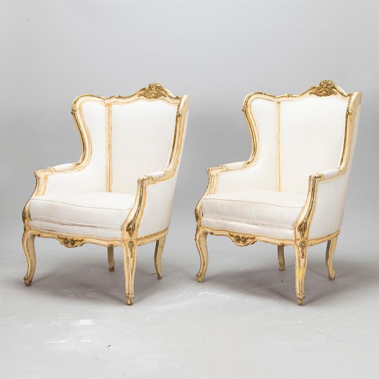 A pair of louis quinze style bergerer armchairs, first part of the 20th century.