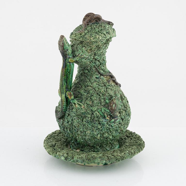 A majolica ewer with cover and stand, M. Mafra, Caldao, Portugal, late 19th Century.
