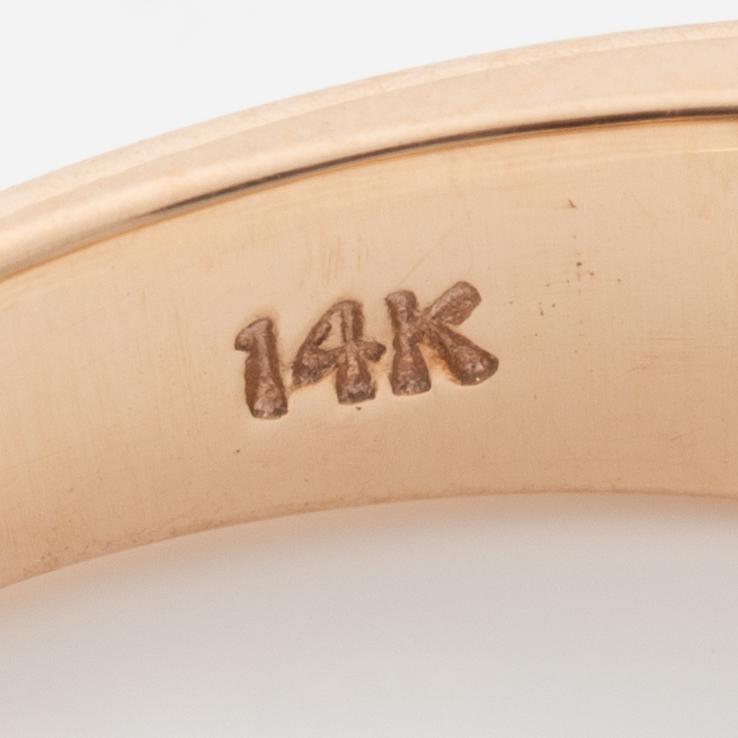 14K rose gold ring with round brilliant-cut diamonds.