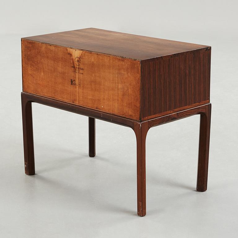 A mirror and chest of drawers by Aksel Kjersgaard, Odder, Denmark, 1950's-/60's.