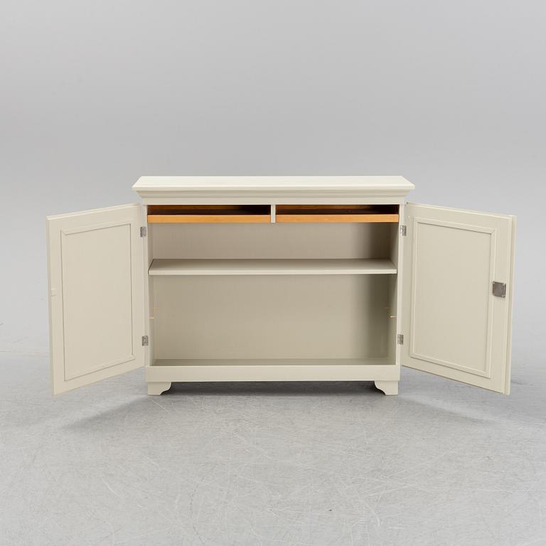 A painted 20th Century cupboard.