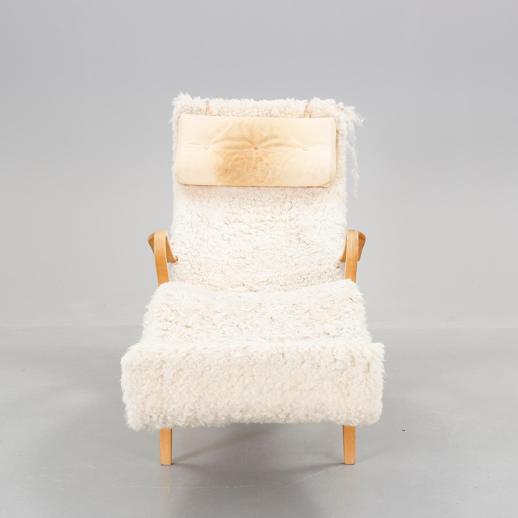 LIGGFÅTÖLJ, "Pernilla", brännmärkt Bruno Mathsson design.