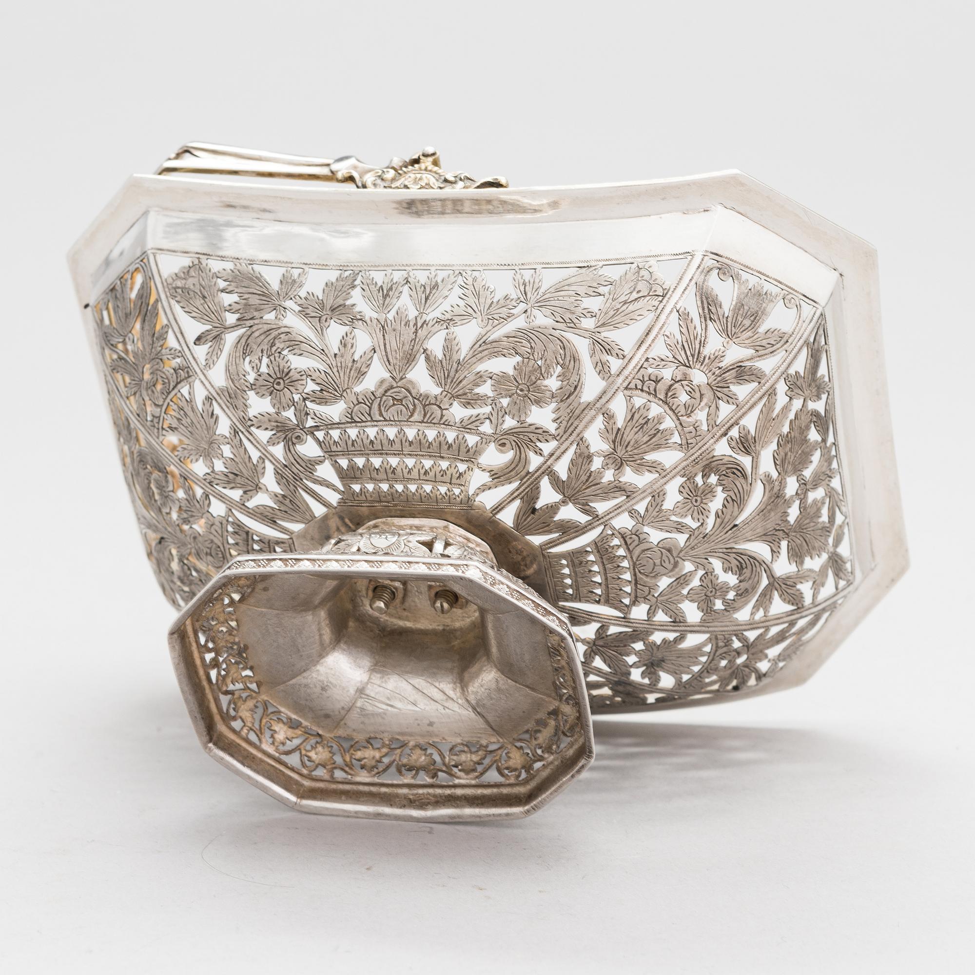 A Russian, parcel-gilt silver swing handle basket, Moscow 1834.