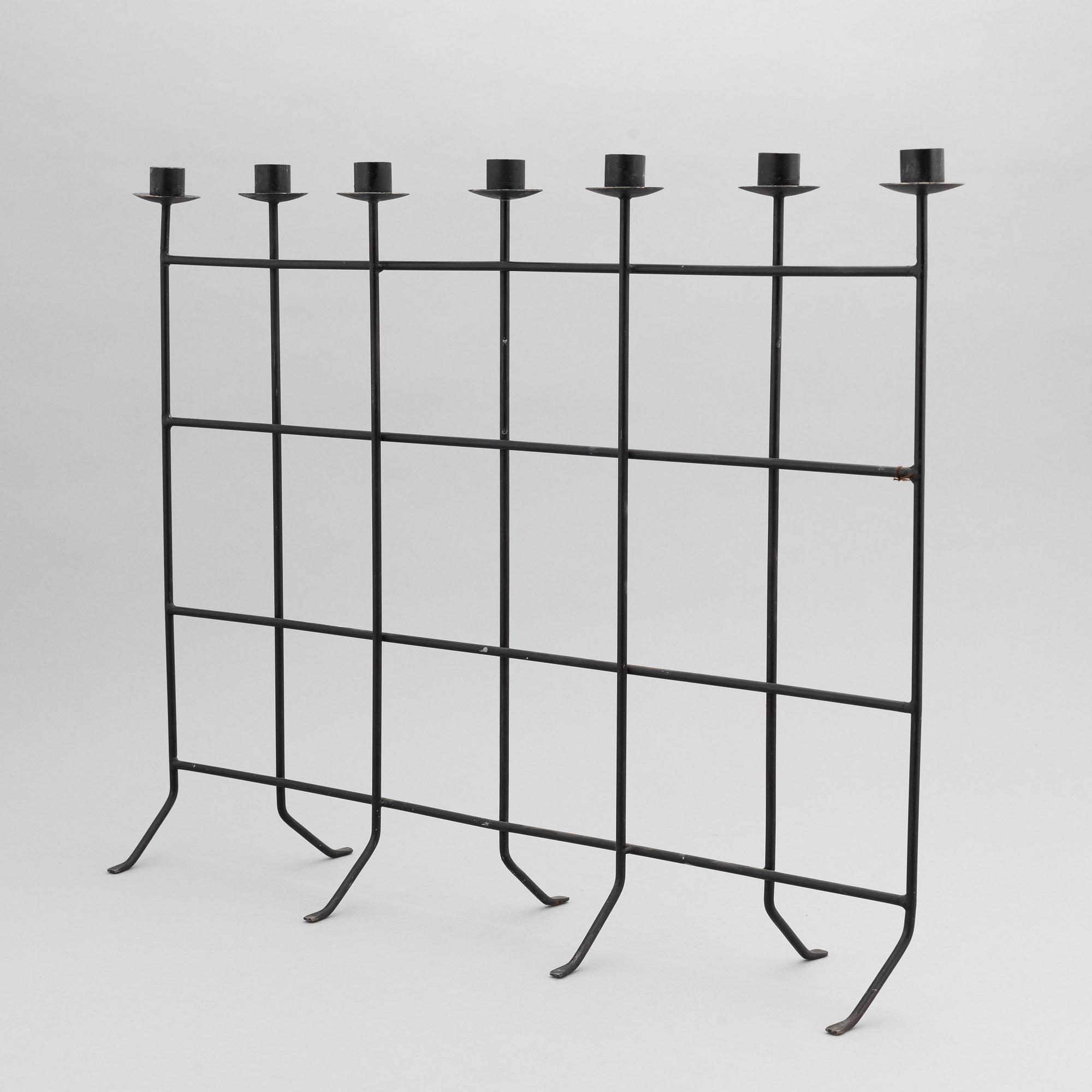 An iron candlestick, second half of the 20th Century.