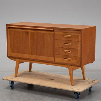 A 1950's teak sideboard.