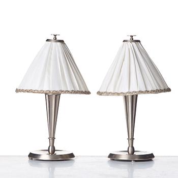 HARALD ELOF NOTINI, a pair of pewter table lamps by Böhlmarks, Stockholm 1920's-30's.