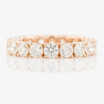 Eternity ring with brilliant-cut diamonds.