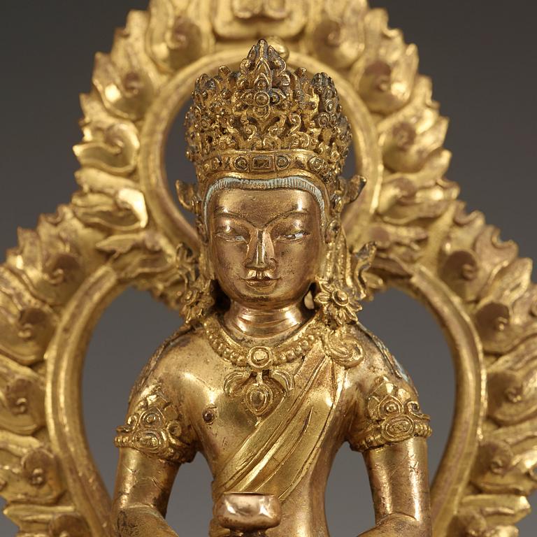 A gilt bronze figure of Amitayus, Qing dynasty, Qianlong (1736-95).