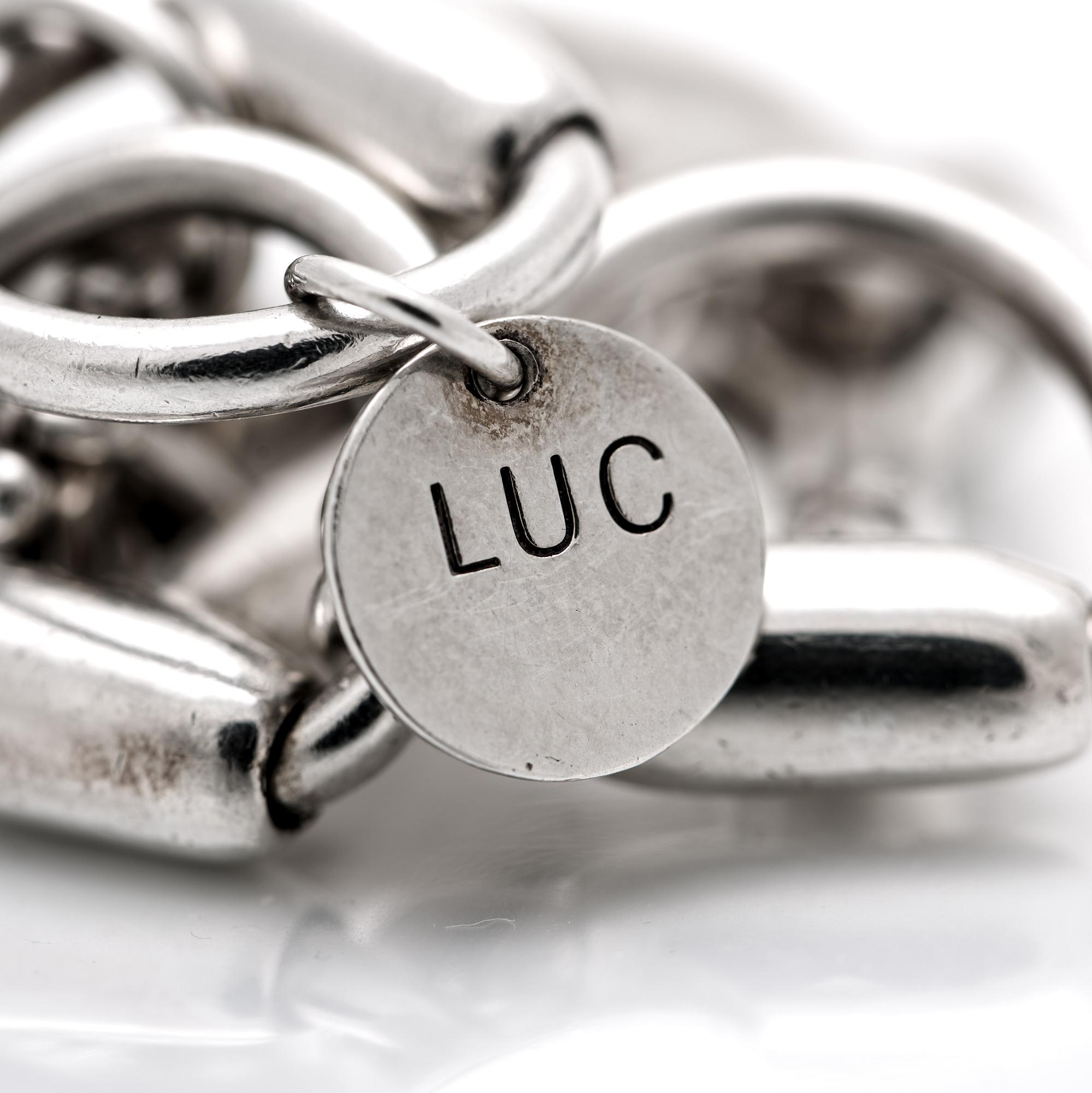 ARMBAND, silver i form av hästbetsel.