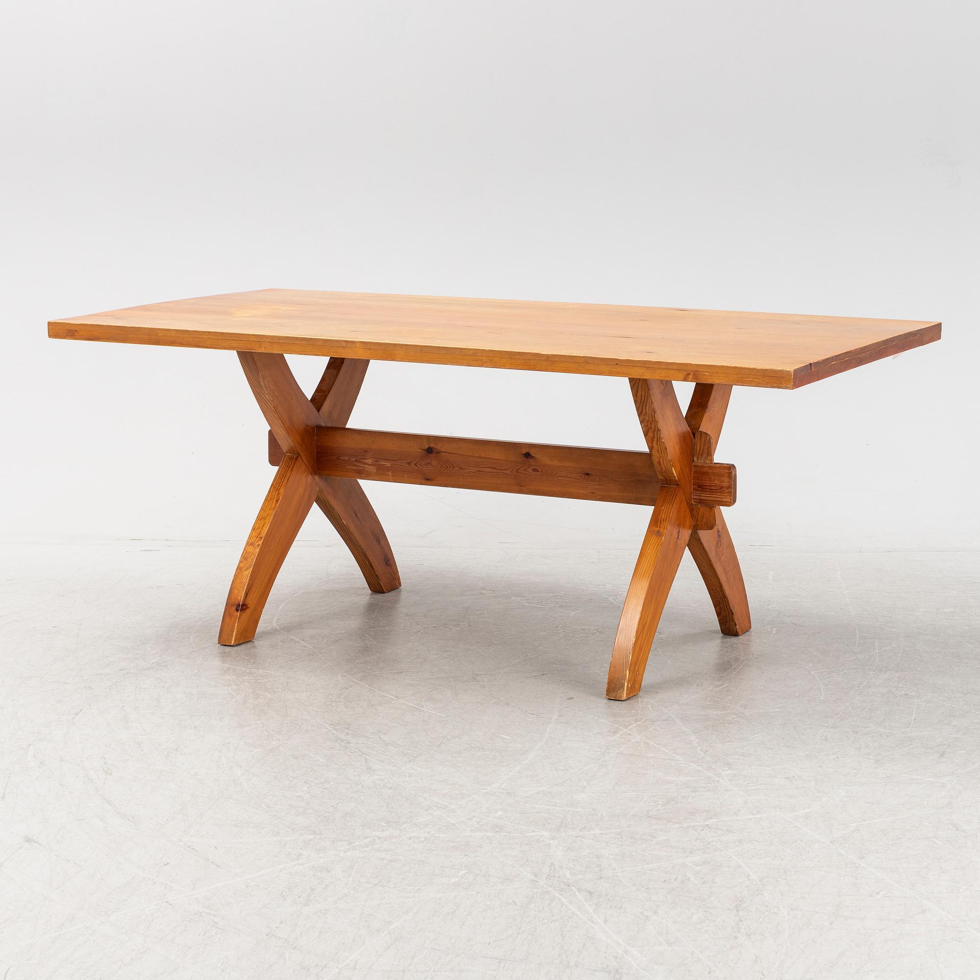 A pine trestle table, later part of the 20th Century.