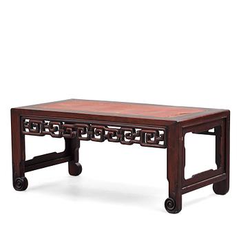 598. A hardwood kang table, China, early 20th Century.