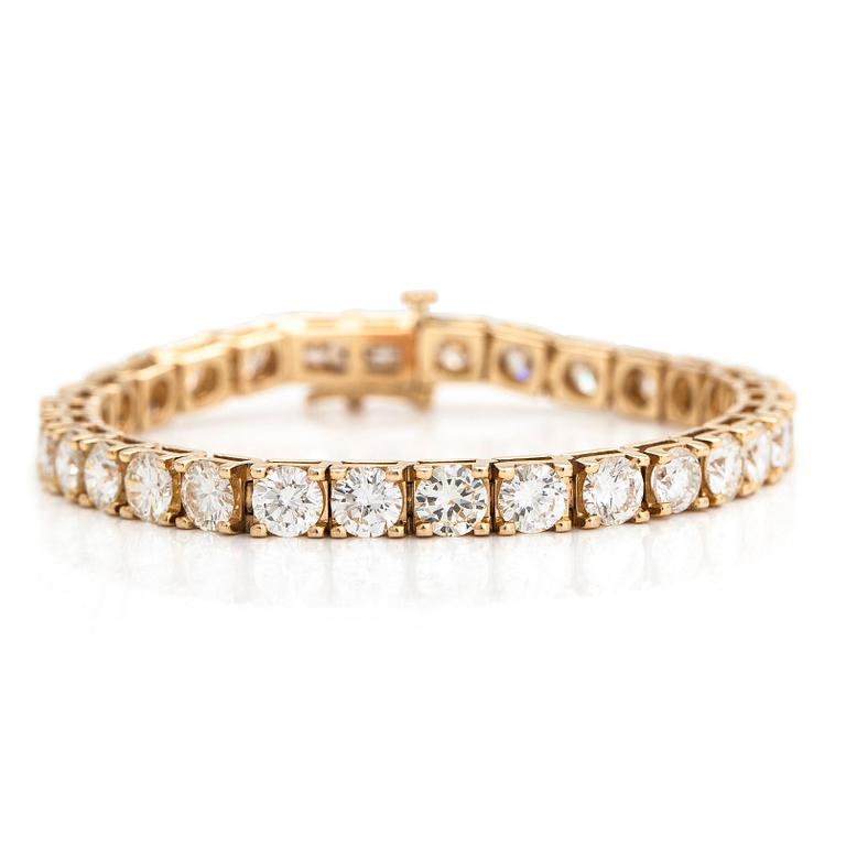 Tennisarmband, 14K guld med briljantslipade diamanter totalt ca 12.00 ct.