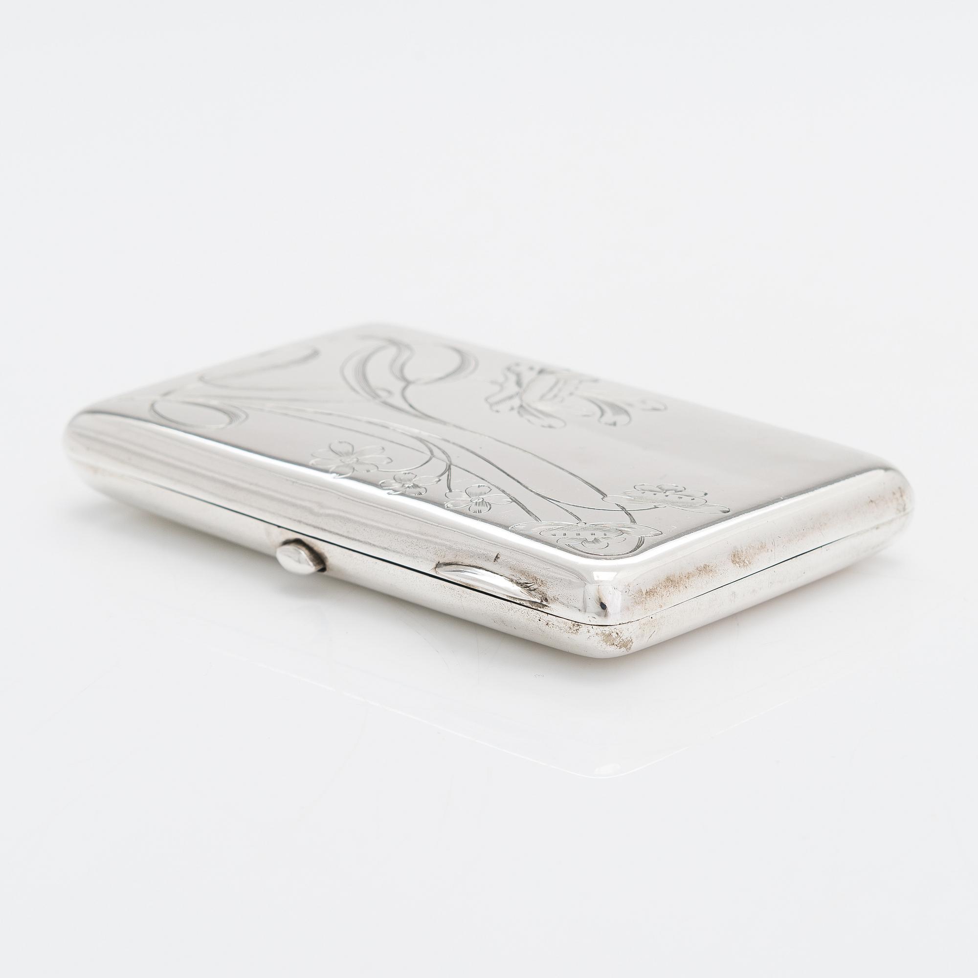 A silver cigarette case, maker's mark of Vasili Sikazev, Moscow 1908-17.