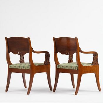 A pair of Baltic / Russian mahogany Empire armchairs, first part 19th century.