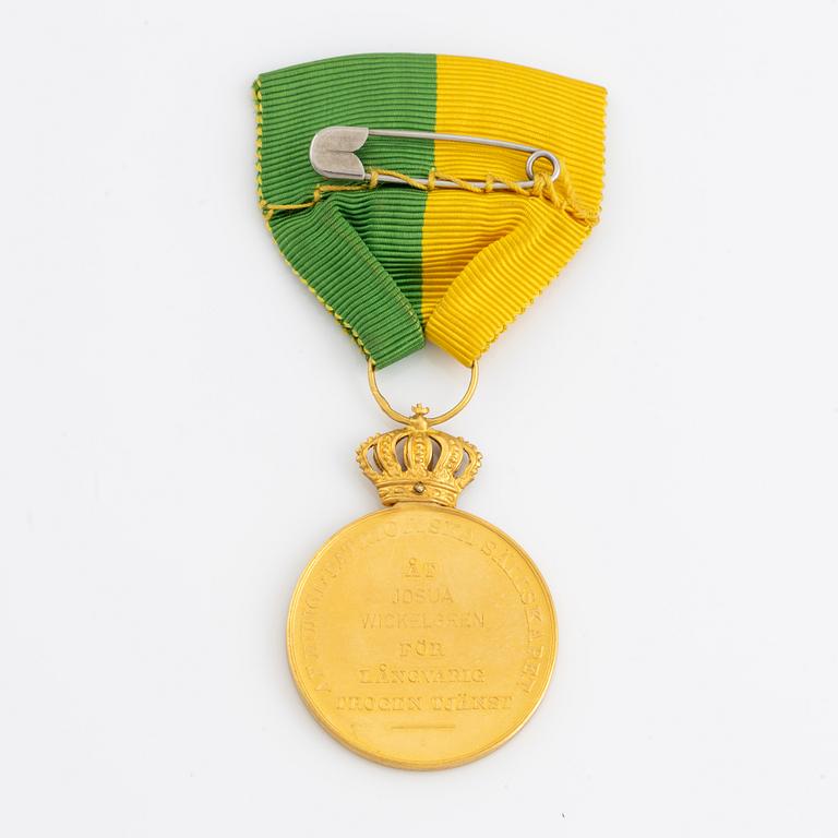 Gustaf V, medalj, 18 k guld, Kungliga Patriotiska Sällskapet, 1947.