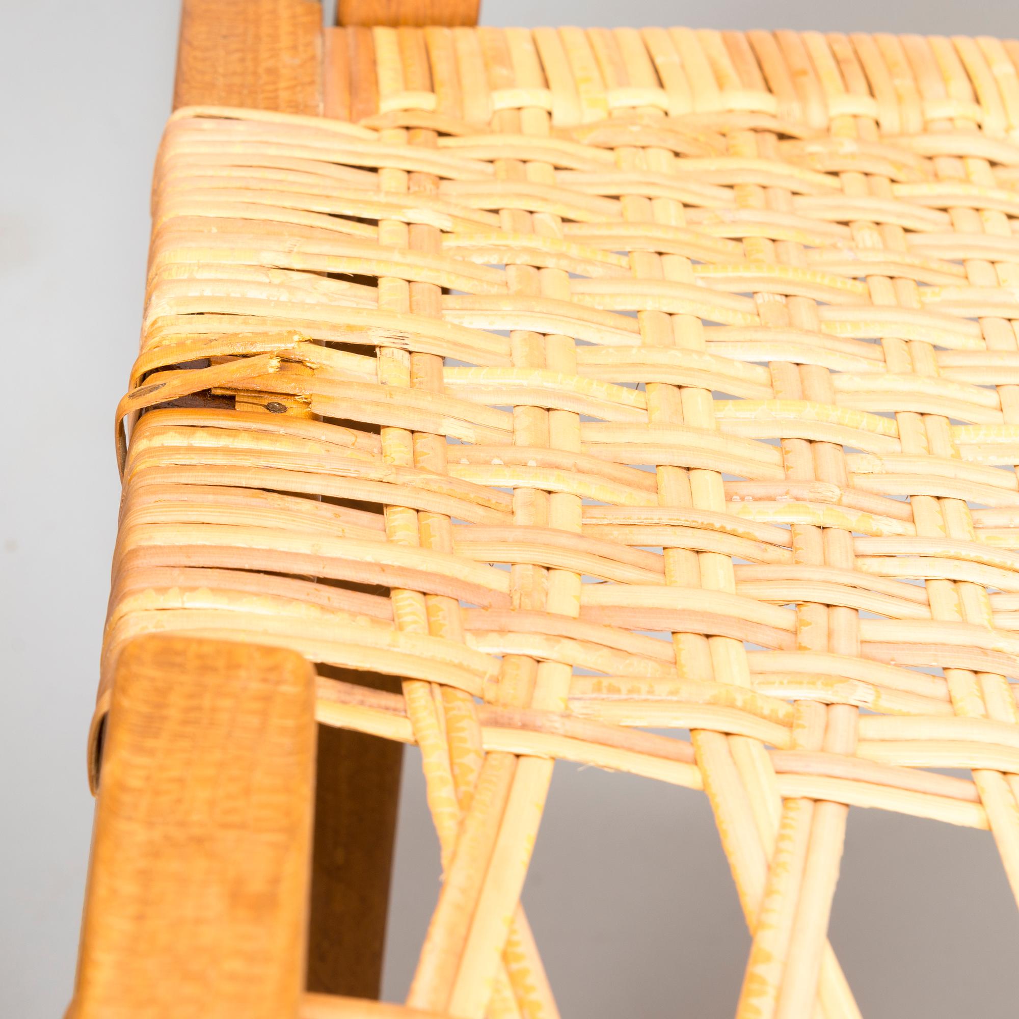 HANS J WEGNER, A pair of JH-512 folding chairs for Johannes Hansen, Denmark, early 1980s. Model designed in 1949.
