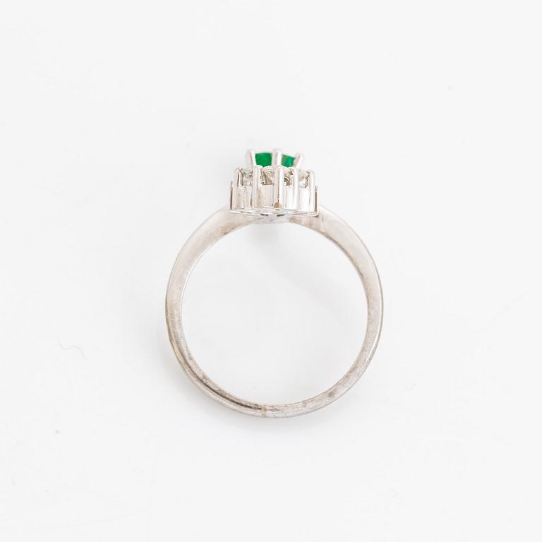 Emerald and brilliant cut diamond ring.