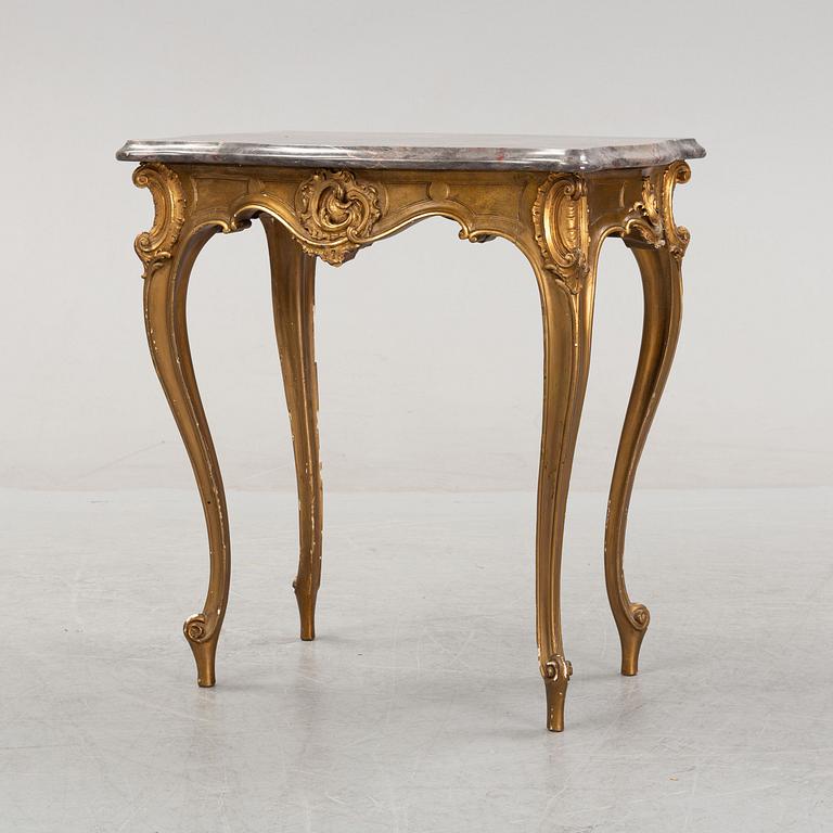 A rococo style table, around 1900.