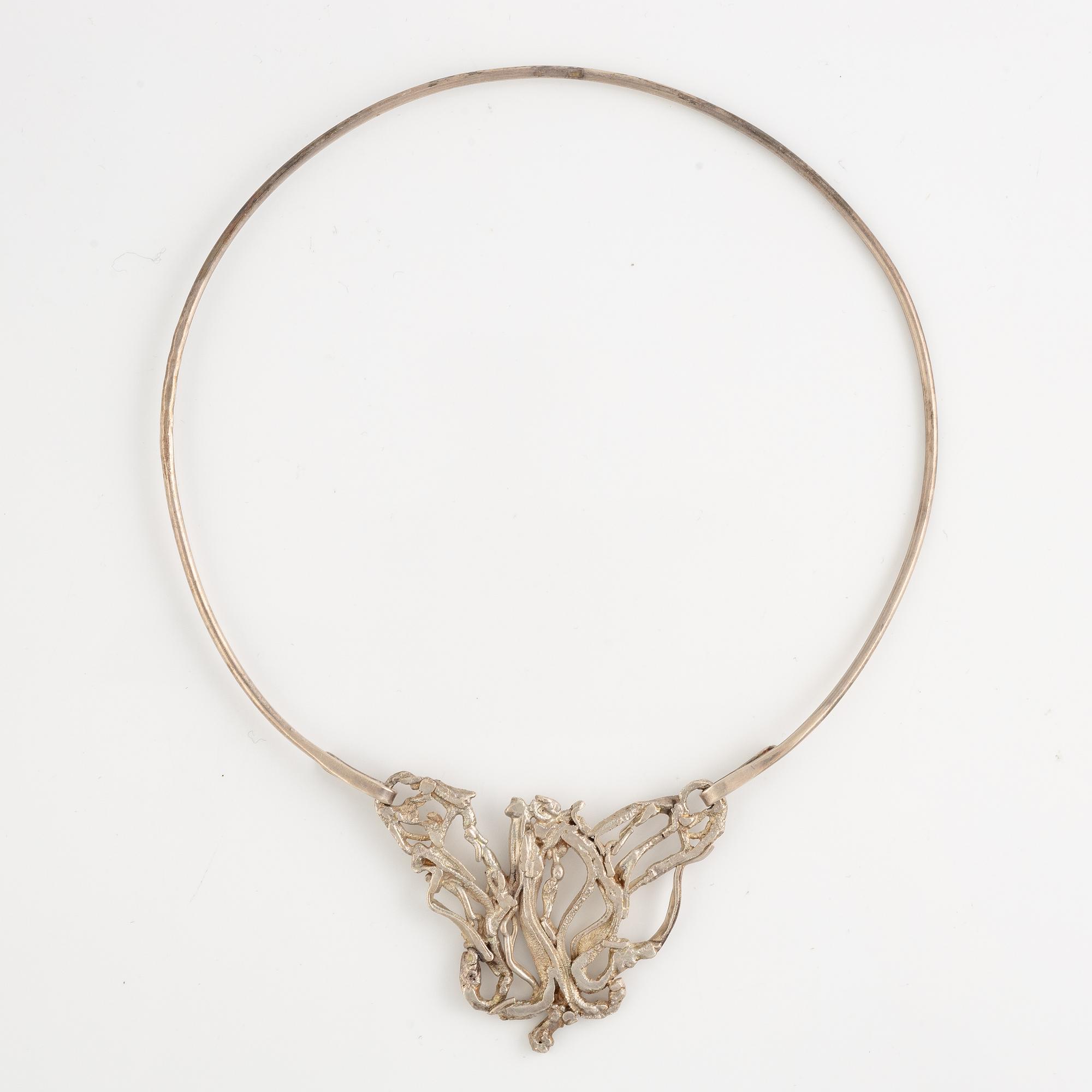 Lars Arby, three neck rings with pendants, silver, Gothenburg including 1977, 1978, and 1982.